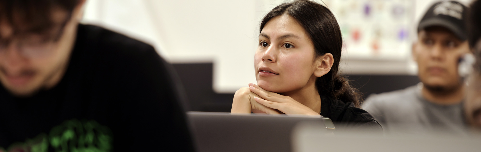 Student listens to professor.