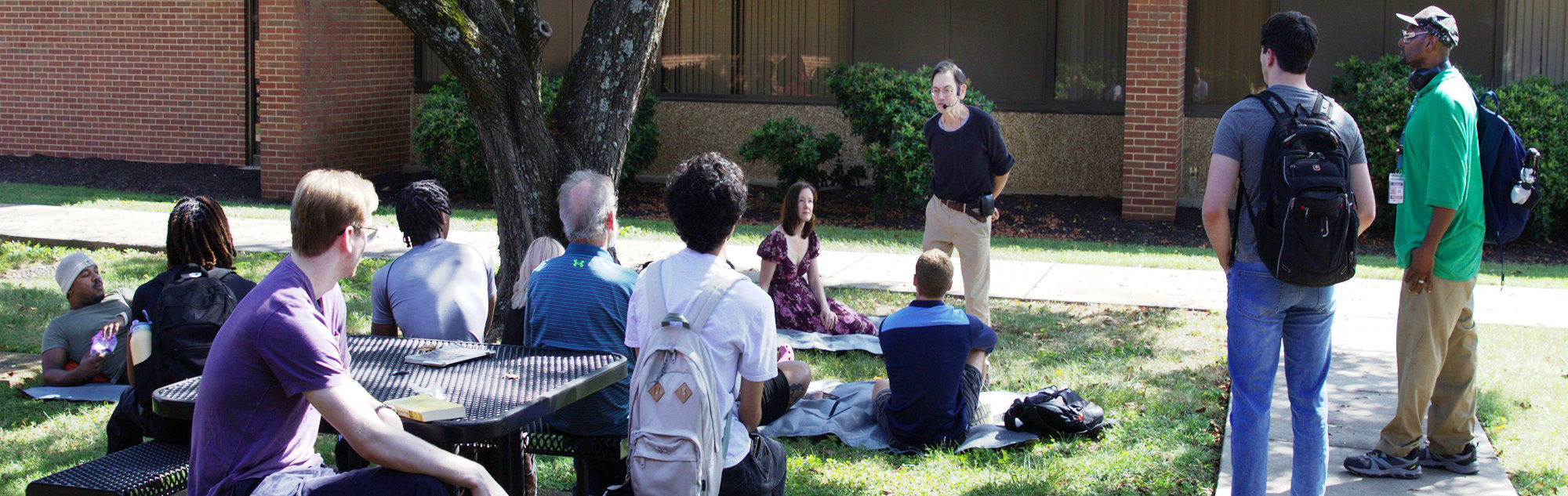History professor interacts with students.