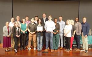 A ceremony was held at Cat Financial headquarters to honor two graduates of Nashville State’s School of STEM Information Technology program, who have been working through a 20-month Information Technology apprenticeship at the company..